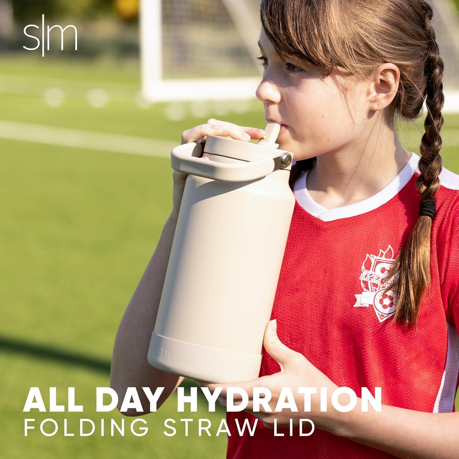 imageSimple Modern Trek Pivot  Half Gallon Water Bottle Jug with Handle ampamp Boot  Interchangeable Straw ampamp Chug Lids  Large Insulated Stainless Steel  Sports Camping Outdoors  64oz Forest Midnight Black